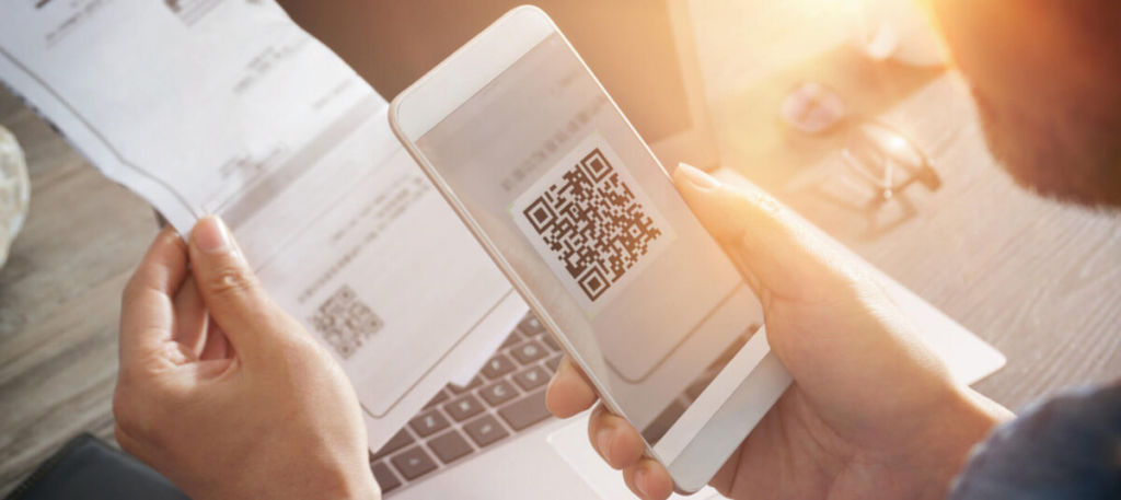 Person scanning QR code