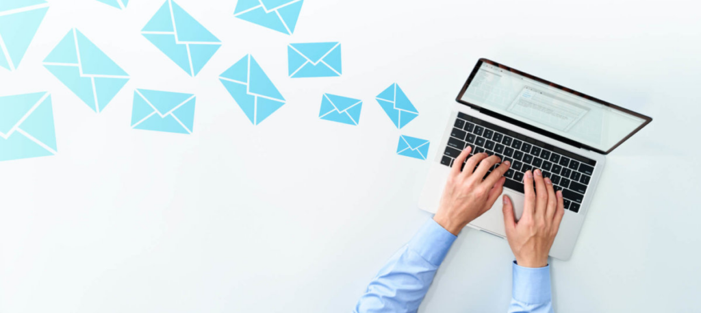 Person send emails on laptop