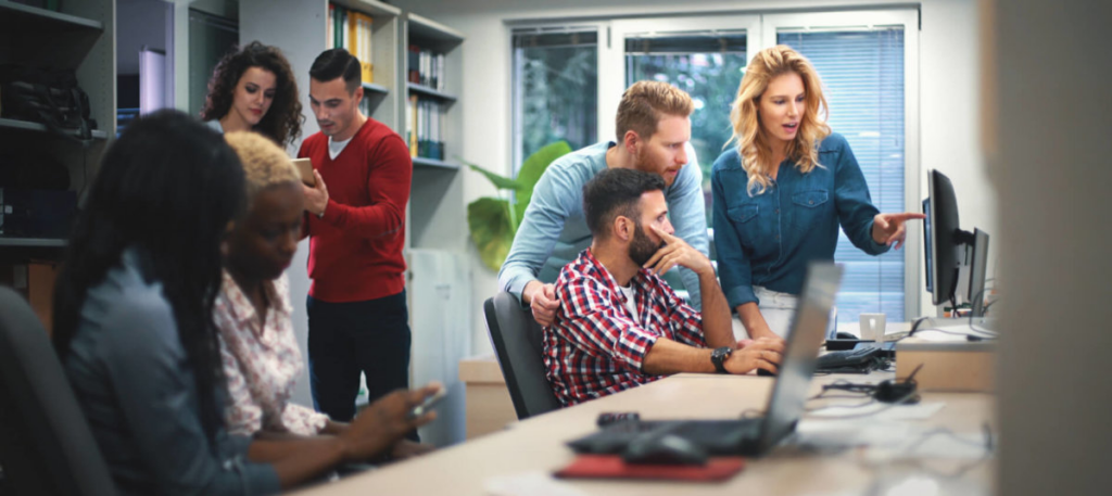 Employees working collaboratively in an office
